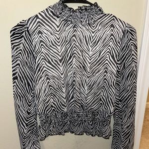 Boutique zebra print top size XS. Never worn